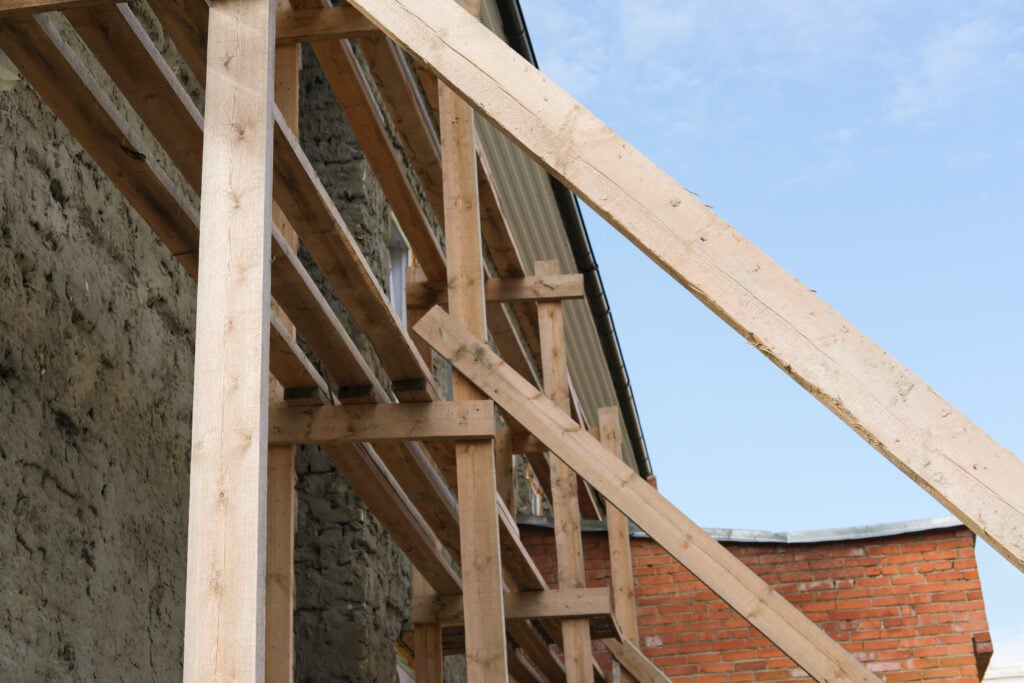 scaffolding-of-a-brick-house-reconstruction-of-a-2021-12-24-01-14-36-utc