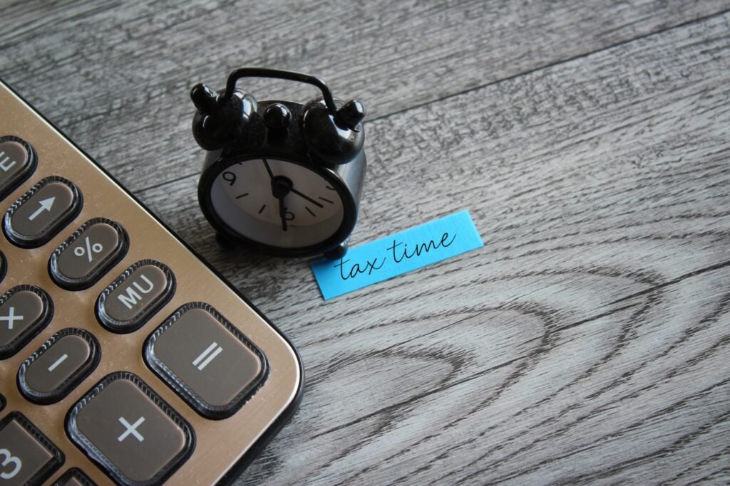alarm-clock-and-calculator-with-text-tax-time-2023-04-05-22-45-48-utc