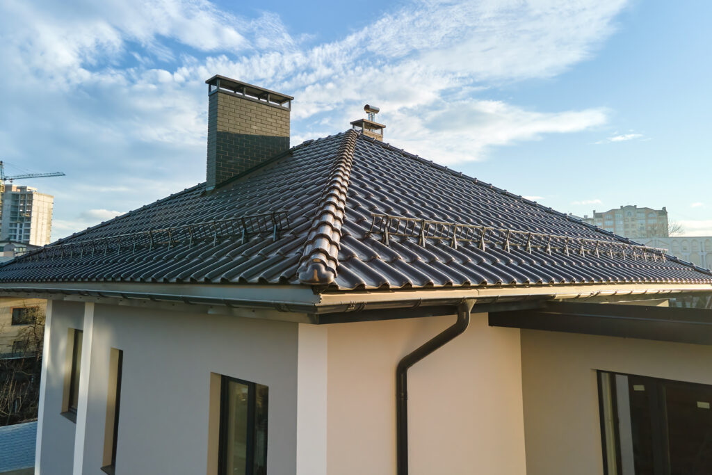 closeup-of-house-roof-top-covered-with-ceramic-shi