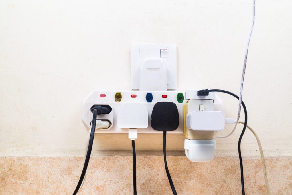 multiple-electricity-plugs-attached-to-multi-adapt